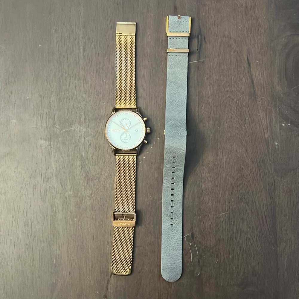 Men’s rose gold MVMT watch with extra grey band